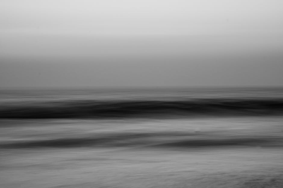 Vast ocean with peaceful waves under ethereal lighting